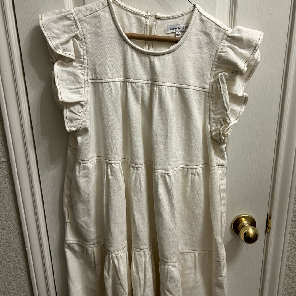 Cream Ruffle-Sleeve Women’s Denim Dress by Jacquie the Label. Never worn.